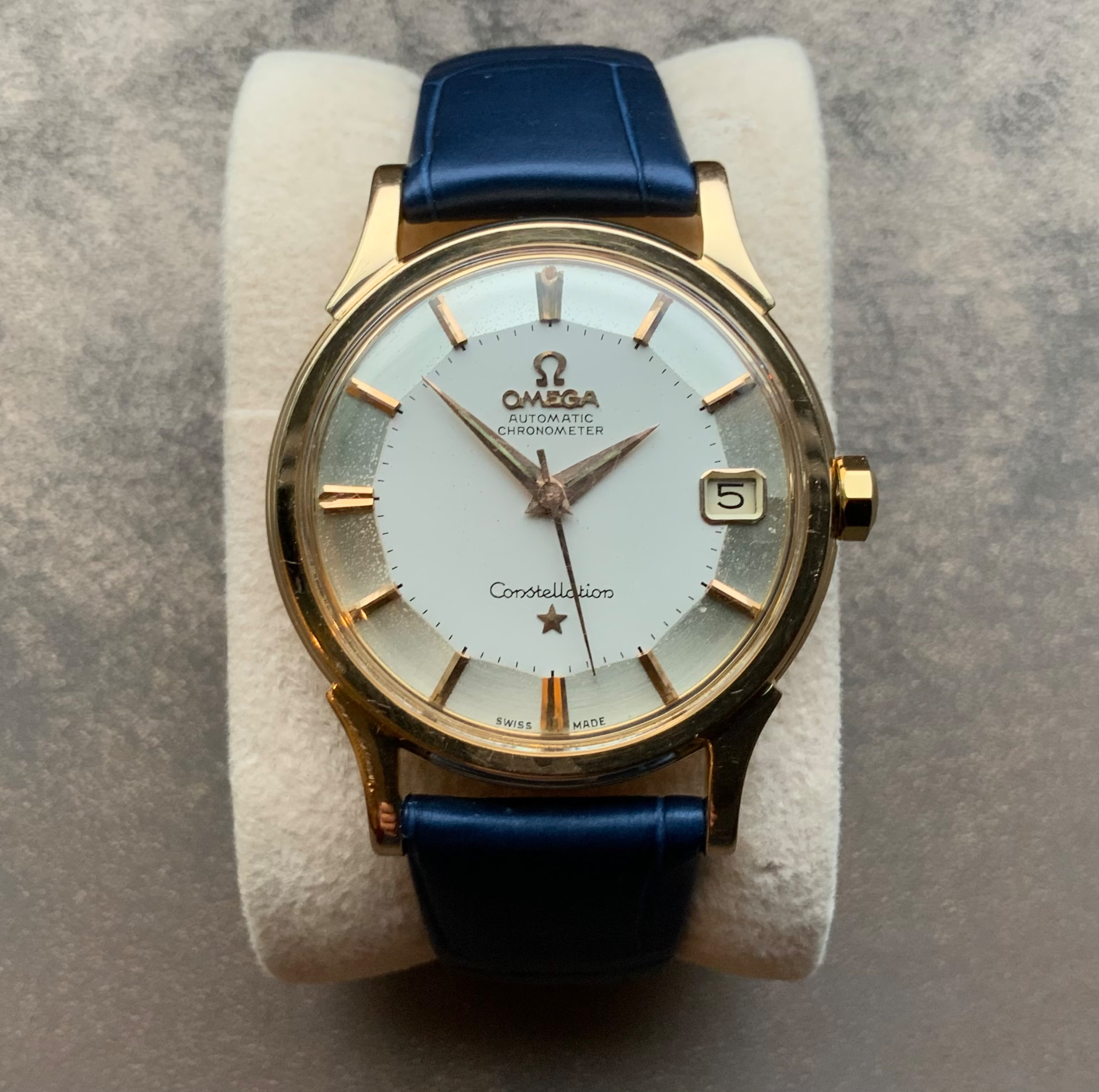 Omega Constellation Pie-Pan chronometer in gold on blue leather strap