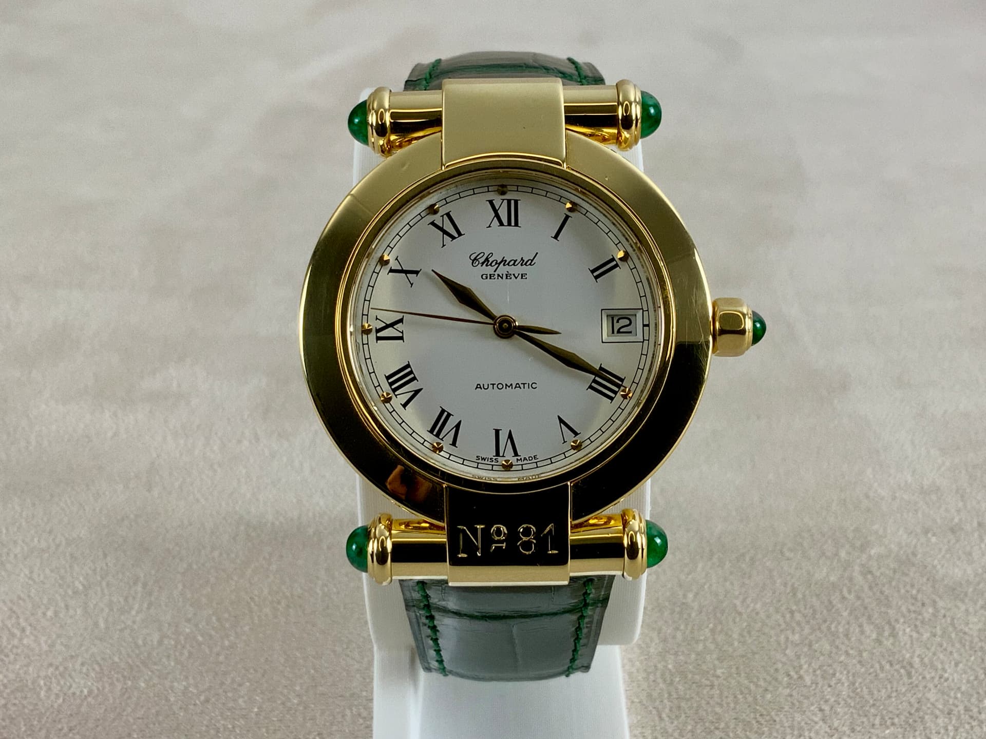 Chopard Imperiale automatic in 18k yellow gold with emerald cabochons and green strap