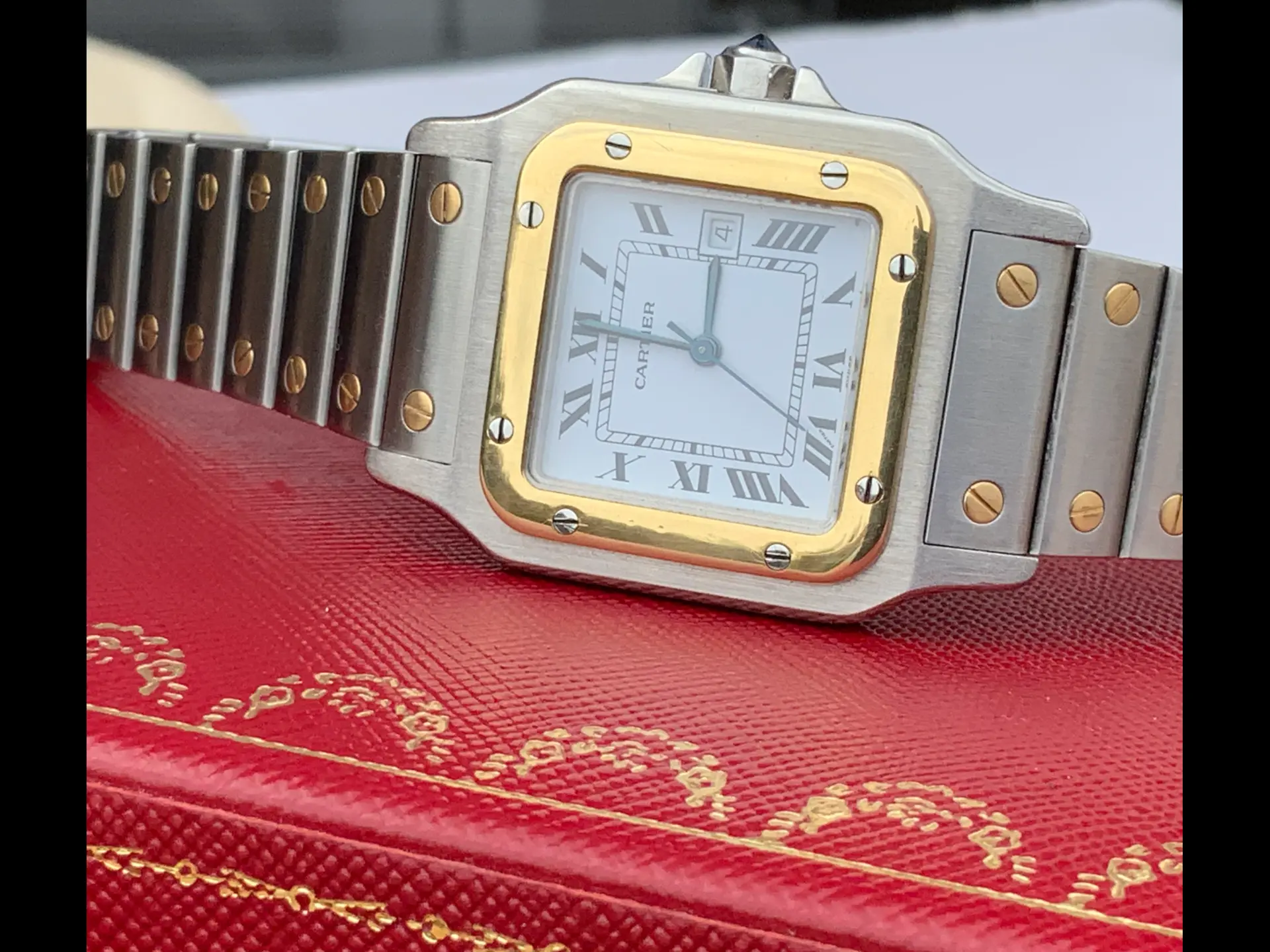 Cartier Santos Galbee in steel and yellow gold with white Roman dial