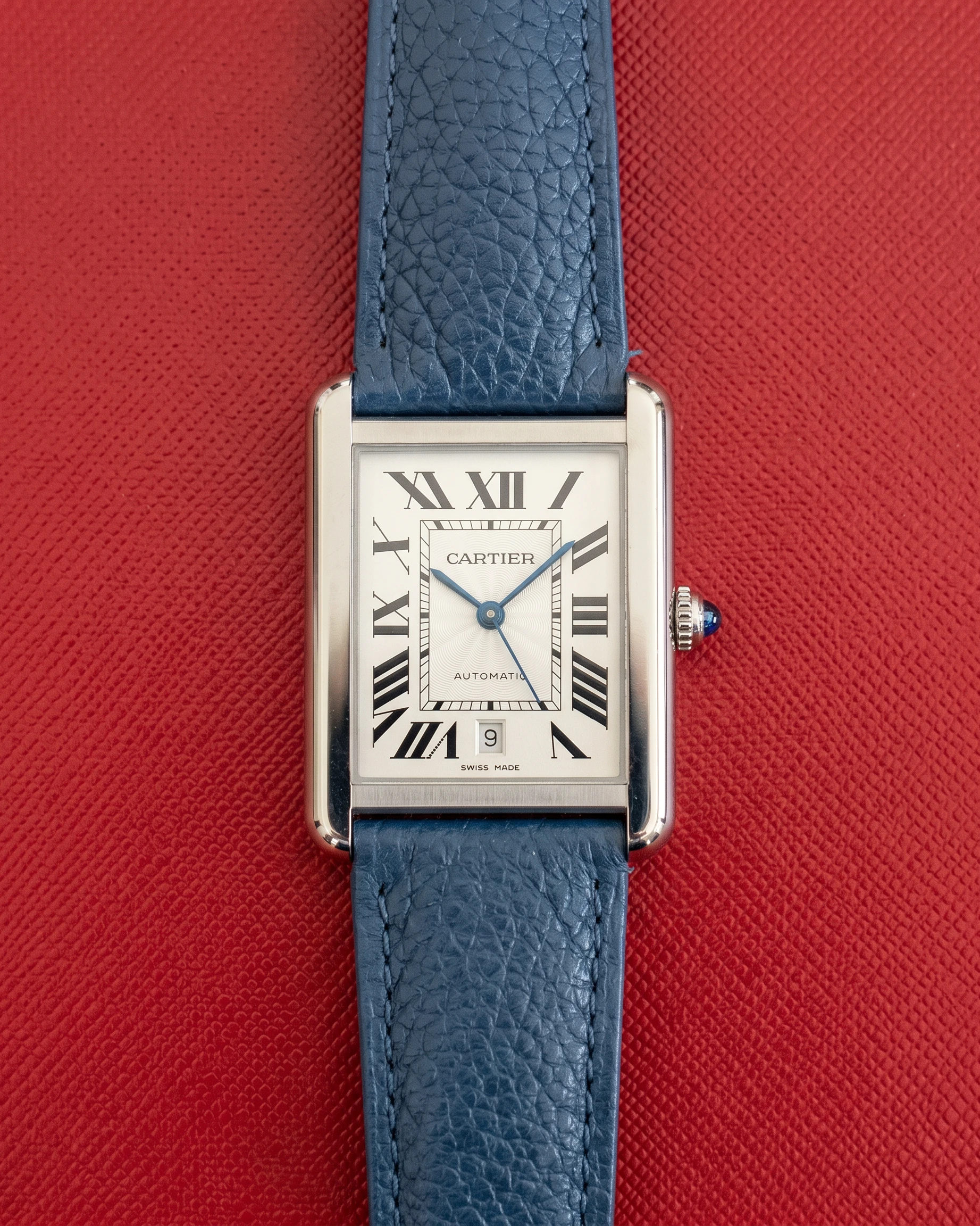 Cartier Tank Solo XL automatic in steel with cream Roman dial on blue leather strap