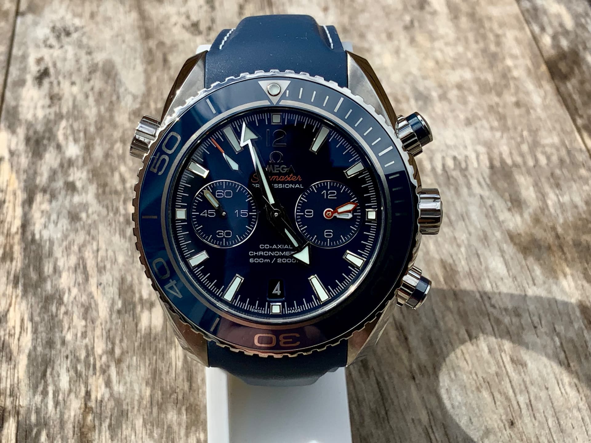 Omega Seamaster Planet Ocean chronograph with blue dial and blue rubber strap