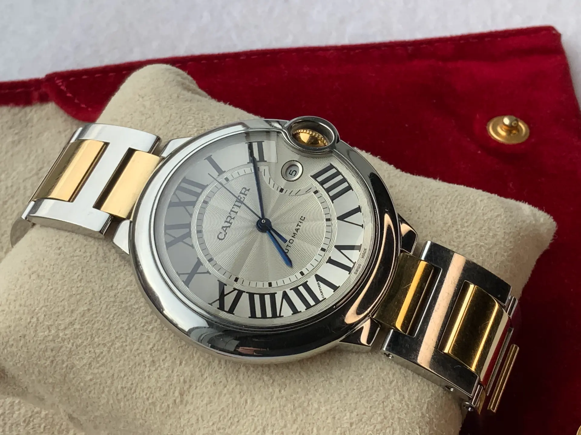 Cartier Ballon Bleu 42mm automatic in steel and yellow gold with silvered dial